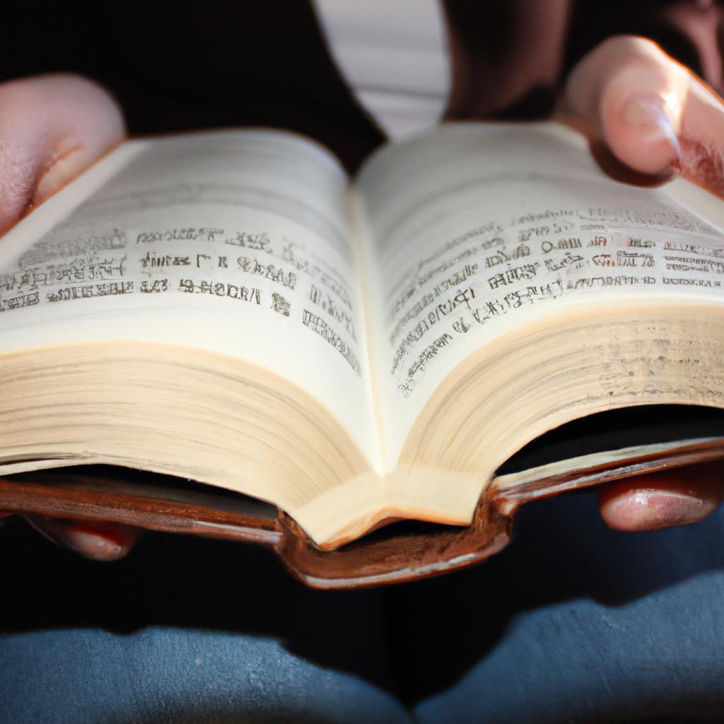 Person holding open family Bible